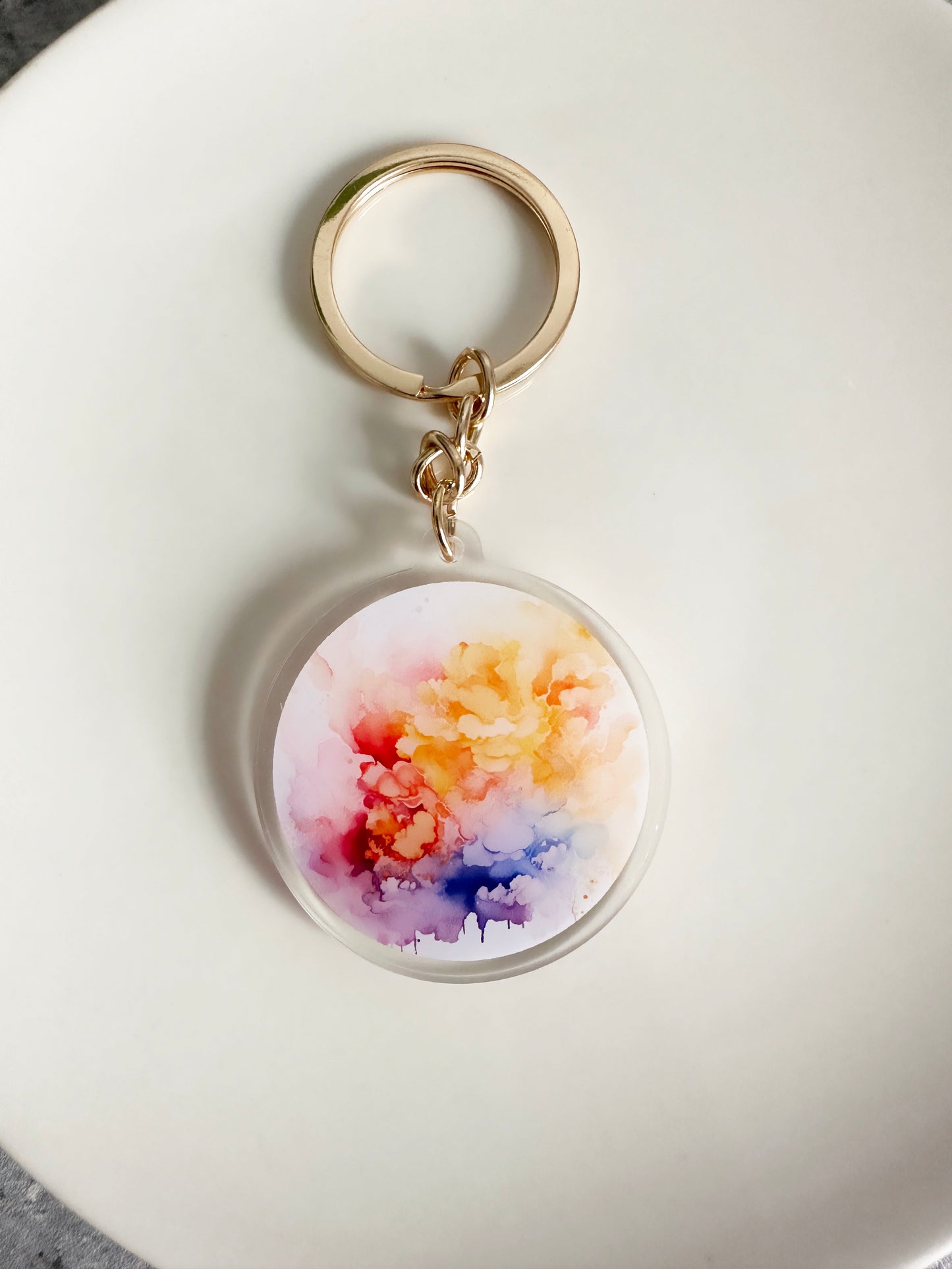 Watercolor keychain on a gold keyring