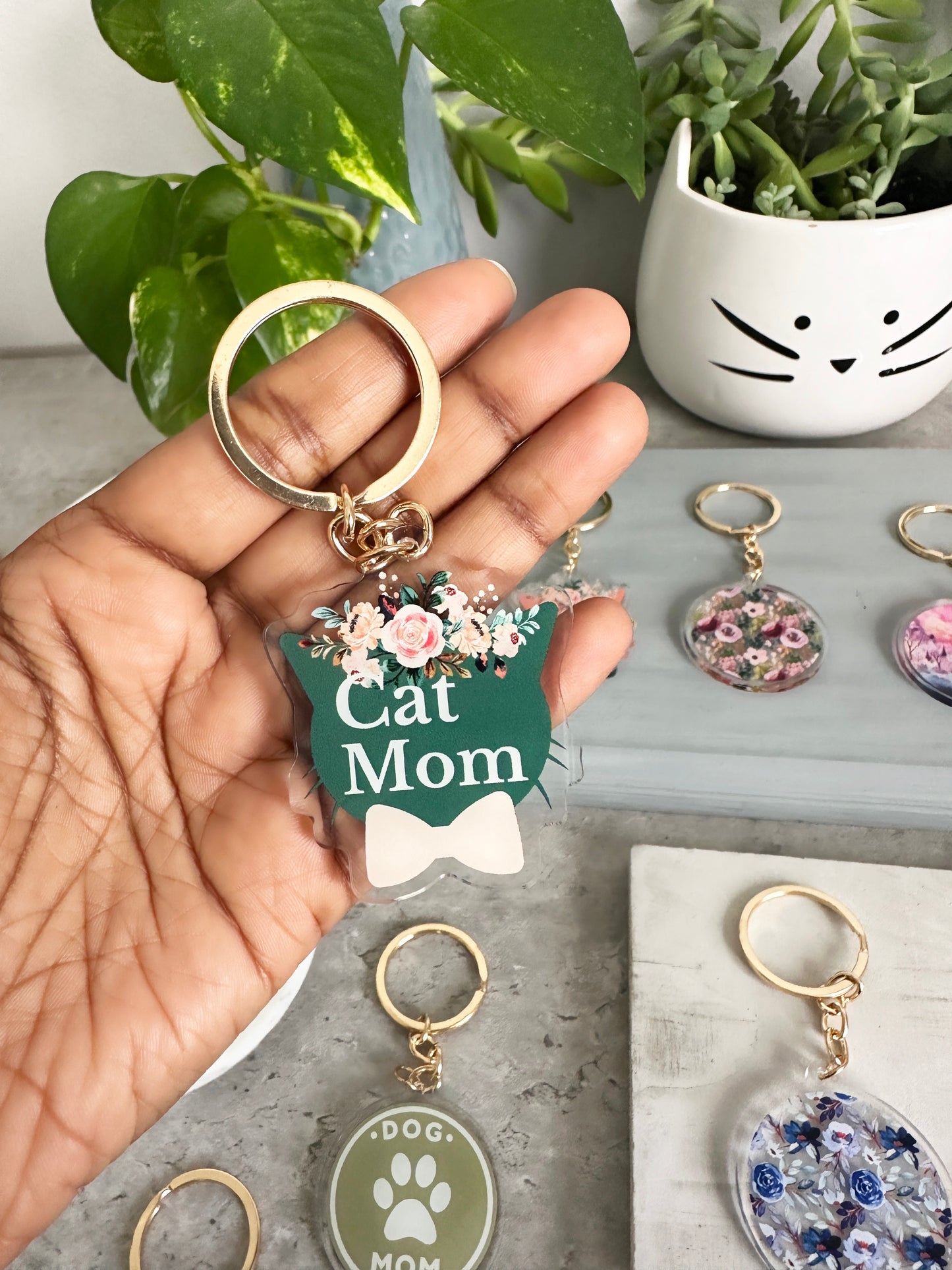 Cat Mom keychain with cat outline bowtie and flower crown